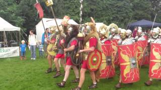 Roman Reenactment at the Amphitheatre in Caerleon Marching In [upl. by Rebmeced]